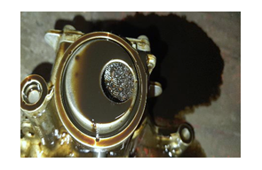 Remnants of the belt in Oil Pump Strainer